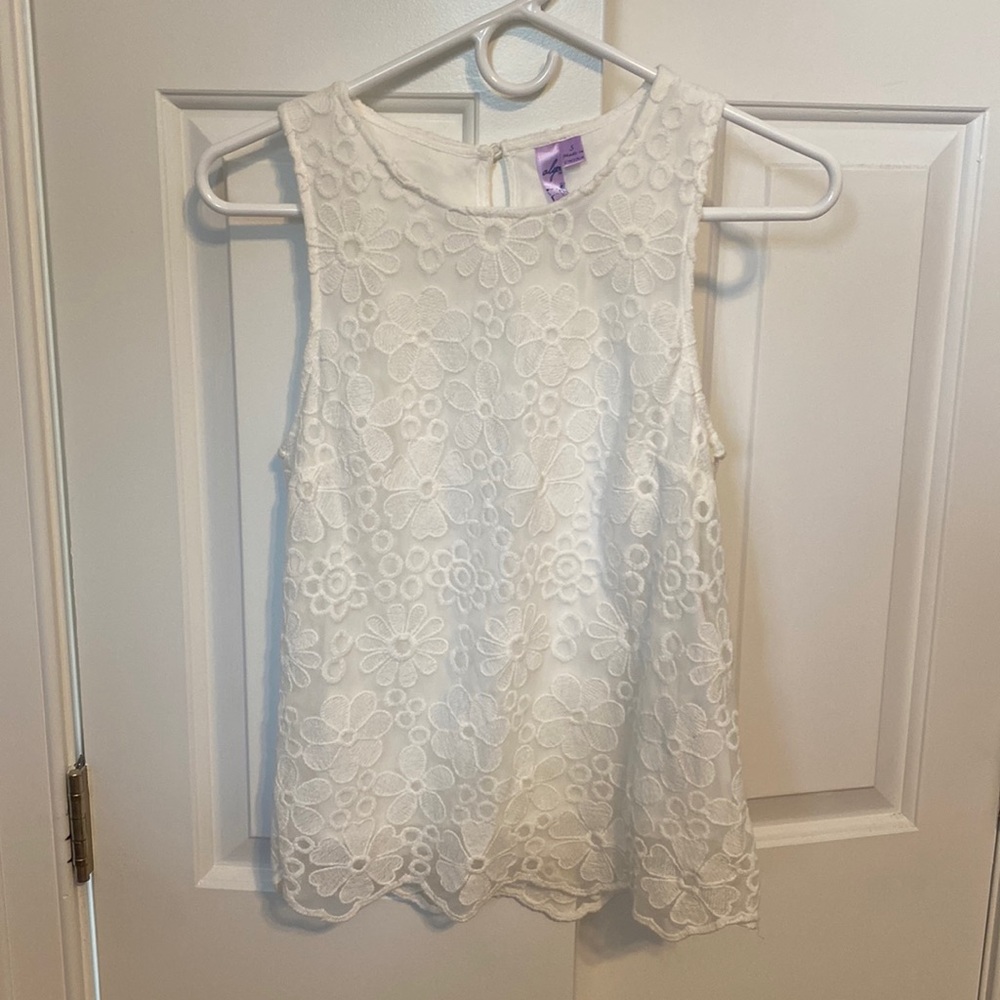 Francesca’s white blouse